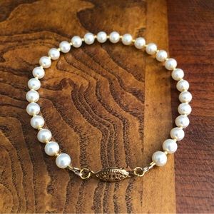 Vintage repaired glass cream pearl long length bracelet